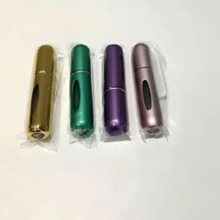 Merkloos Navulbare Parfum Flesjes -Essie winkel 550x423