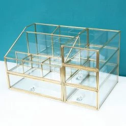 Goux.nl Beautybox Tara | Goud | Cosmetica Organizer | Sieraden Organizer | Make Up Organizer | Beautybox | Vitrine Boxje | Glazen Box | Makeup Organizer | Beauty Organizer | Makeupbox | Organizer | Storage Box | Make-uporganizer | Opbergdoos | Sieradendoos -Essie winkel 550x550 708